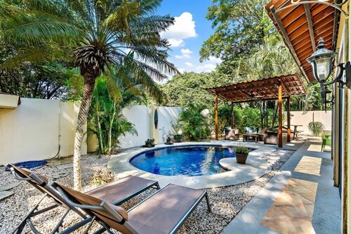 Inviting Home with Colorful Decor and Private Backyard Oasis with a Swimming Pool & Shaded Terrace