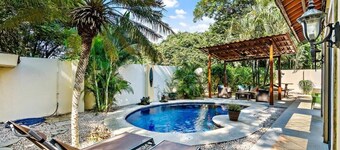 Inviting Home with Colorful Decor and Private Backyard Oasis with a Swimming Pool & Shaded Terrace