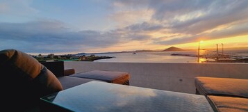 Seasonal outdoor pool, open noon to 10:00 PM, sun loungers