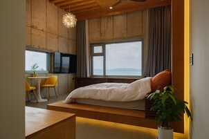 Family Room | 1 bedroom, premium bedding, down comforters, individually decorated