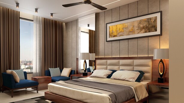 A modern bedroom with a large bed, a sofa, a desk, and a city view. - Cygnett Inn  (Kishangarh)