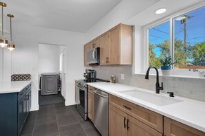 Fridge, microwave, oven, stovetop - Modern Oasis: New Kitchen, Rooftop Deck, Exec Office, Pet-Friendly, Large Yard (Tucson)