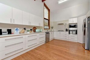 Coffee/tea maker, fridge, microwave, oven