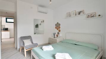 1 chambre, fer et planche Ă repasser, Wi-Fi gratuit, draps fournis