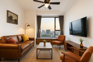 50-inch flat-screen TV with cable channels, Netflix, streaming services - Summerset Apartment - RiverGate Residence (Ho Chi Minh City)