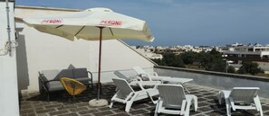 Terrace/patio - Wonderful comfortable house with terrace, garden and garage.<br>Pets allowed. (Carovigno)