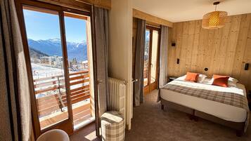 Family Room | Premium bedding, desk, laptop workspace, soundproofing