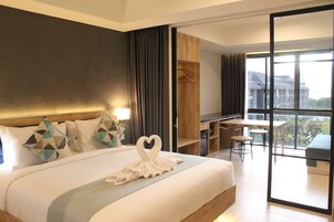 Familien-Suite | Zimmersafe, Schreibtisch, Verdunkelungsvorhänge, schallisolierte Zimmer