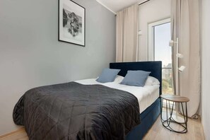 1 slaapkamer, een strijkplank/strijkijzer, wifi, beddengoed