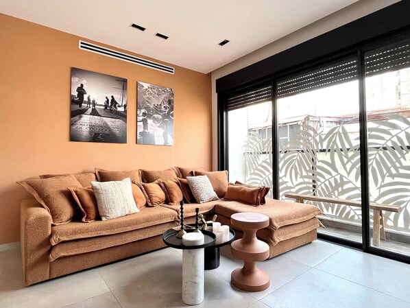 Apartment, 2 Bedrooms, Balcony | Living room | 42-inch flat-screen TV with satellite channels, streaming services - Jerusalem 9 - By Beach Apartments TLV (Bat Yam)