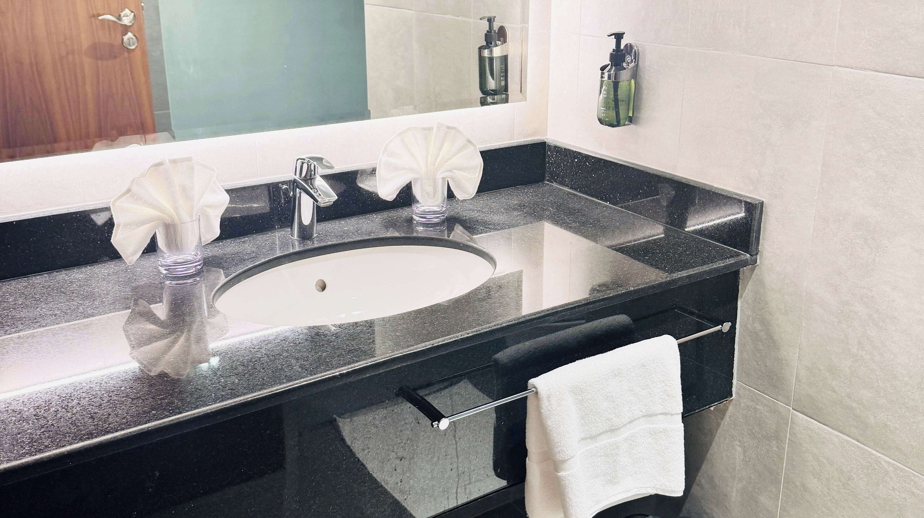 standard room, multiple beds | bathroom | free toiletries, hair dryer, slippers