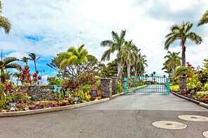 A gated entrance to a property with a sign reading "Kapahni Bay Villas."