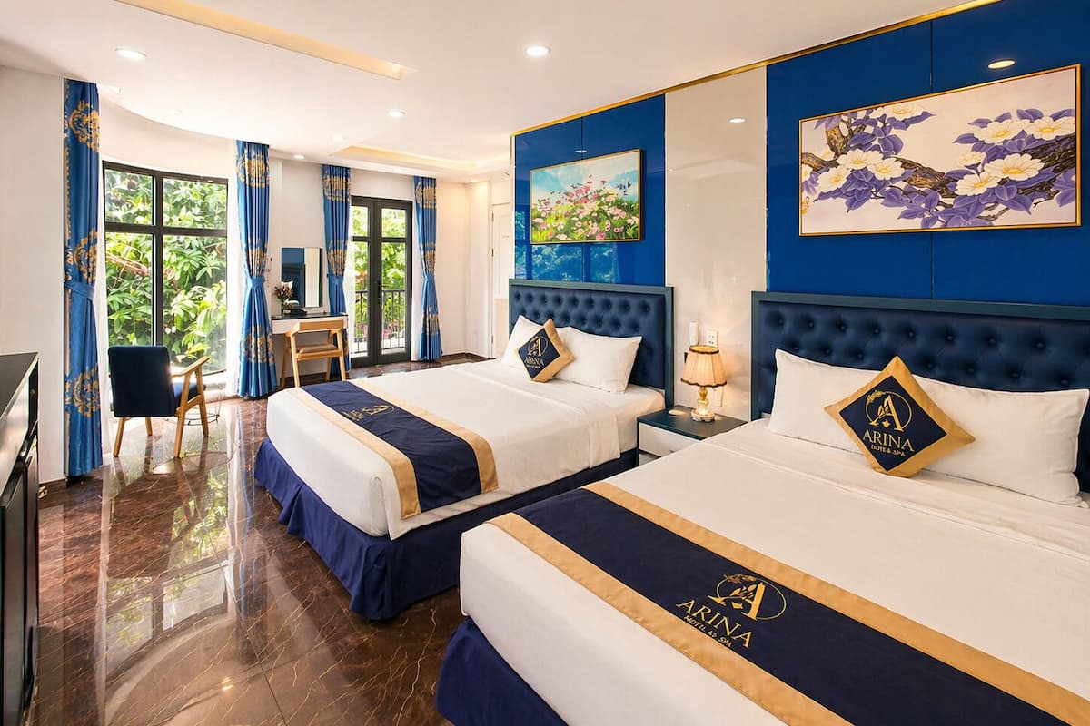 Quadruple Room, Balcony, City View | Hypo-allergenic bedding, free minibar items, individually decorated