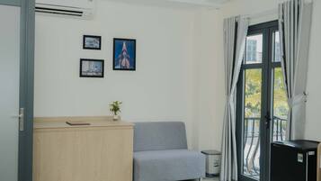 Deluxe Triple Room, Balcony, City View