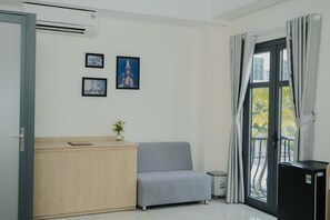 Deluxe Triple Room, Balcony, City View | Hypo-allergenic bedding, free minibar items, individually decorated - Arina Luxury Hotel - Vincom Tay Ninh (Tay Ninh)