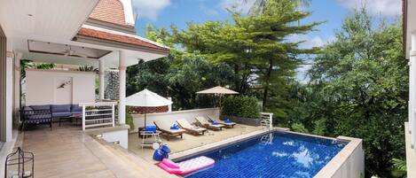 Outdoor pool, sun loungers