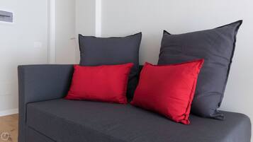 Apartment (1 Bedroom) | Living area | 55-inch flat-screen TV with cable channels, TV