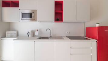 Departamento (1 Bedroom) | Cocineta privada | Refrigerador, microondas, parrilla de estufa y lavavajillas