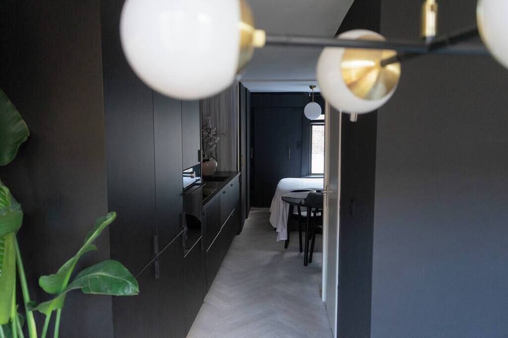 1 slaapkamer, een strijkplank/strijkijzer, wifi