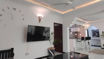 Standard Apartment, 3 Bedrooms, City View, Annex Building | Living area | 55-inch TV with digital channels