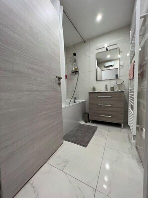 Hair dryer, towels, soap, shampoo