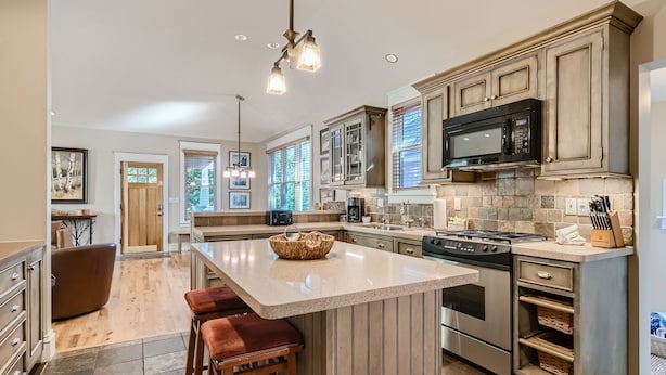 A spacious kitchen with a large island, built-in appliances, and a modern design. - The French St Retreat 4 Bedroom Home by RedAwning (Breckenridge)