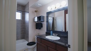 Hair dryer, towels, soap, shampoo