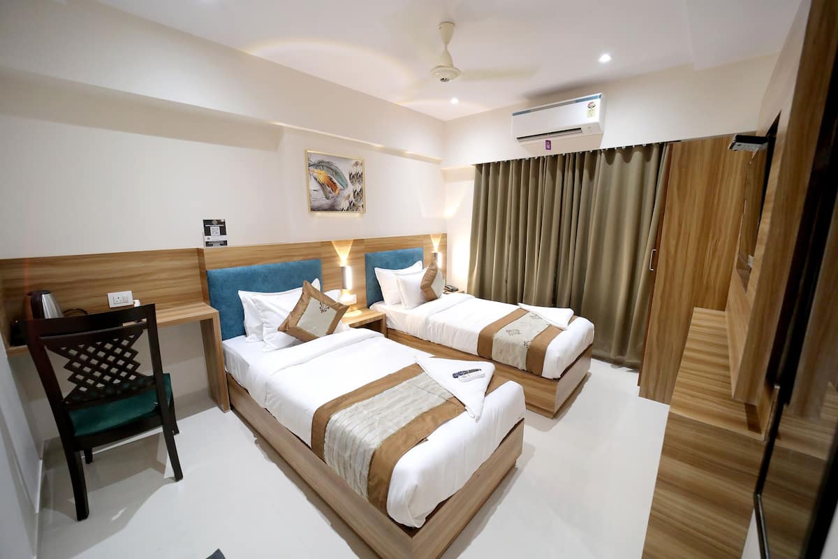 Kamar Double Deluks | 1 kamar tidur, seprai premium, busa memori, dan brankas