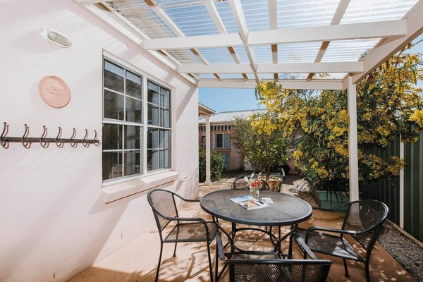 Experience the best of outdoor dining while sizzling up a BBQ feast on the back patio.