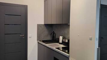 Fridge, oven, electric kettle, toaster