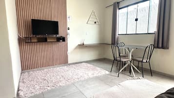 Economy Townhome | Living area | 32-inch Smart TV with digital channels, Netflix, streaming services