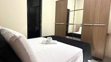 1 bedroom, premium bedding, blackout curtains, iron/ironing board