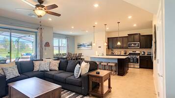 Luxury House | Living area | 55-inch Smart TV with digital channels, table football