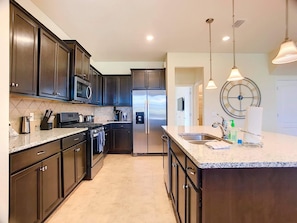 Luxury House | Private kitchen | Full-size fridge, microwave, oven, stovetop