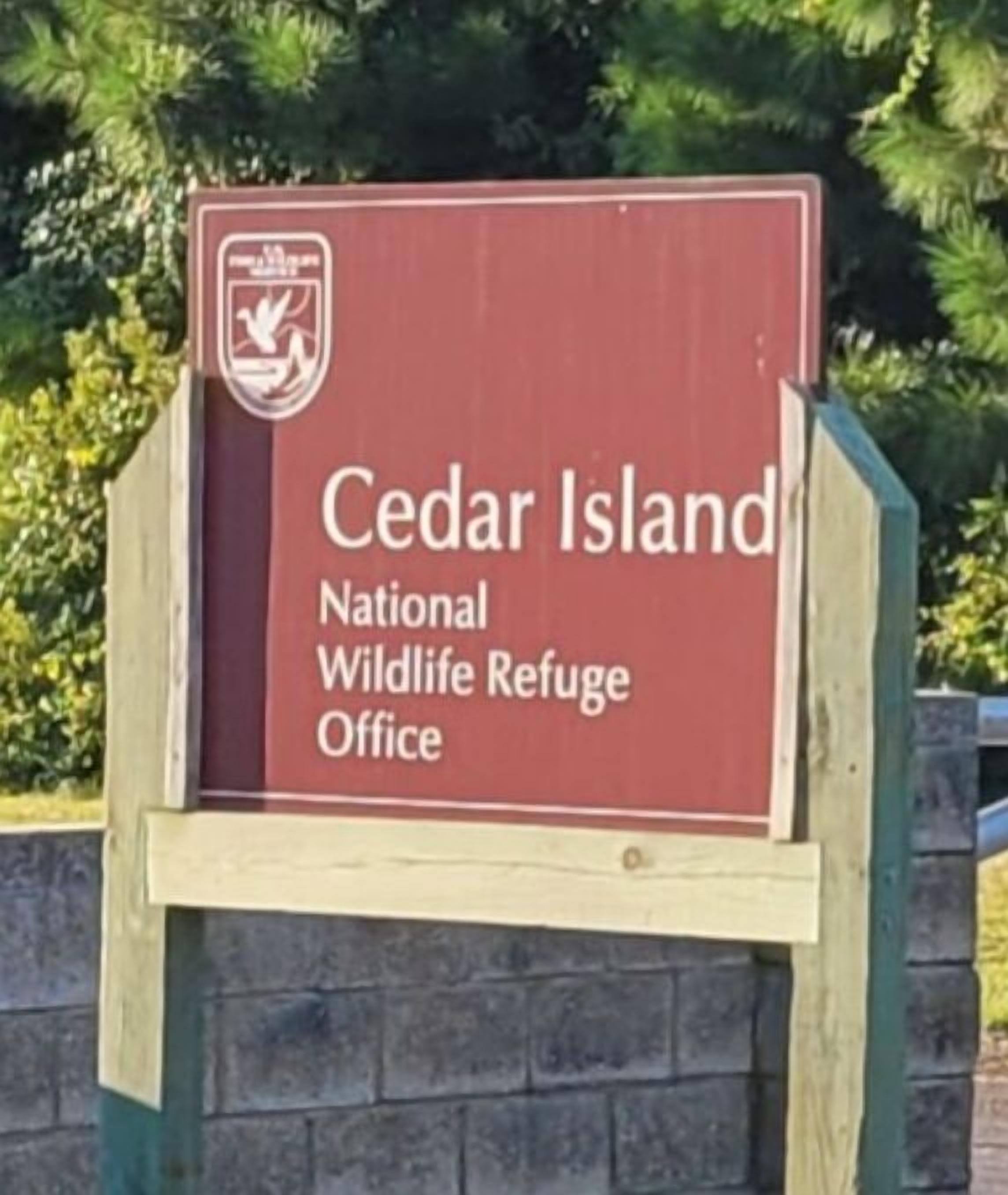 A sign for Cedar Island National Wildlife Refuge Office.