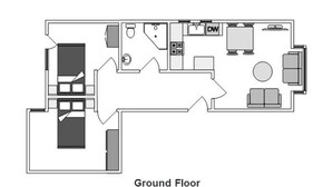 Planta baixa do hotel, mostrando um quarto amplo, cozinha compacta, banheiro e área de refeições.