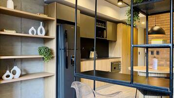 Grand Apartment | Living area | 40-inch Smart TV with cable channels