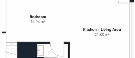 En planritning som visar ett sovrum (14,94 m²), ett badrum (3,38 m²) och ett kök/vardagsrum (21,83 m²).
