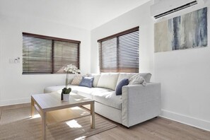 Family Apartment | Living area | 55-inch Smart TV with digital channels - Waves on Walnut (Hollywood)