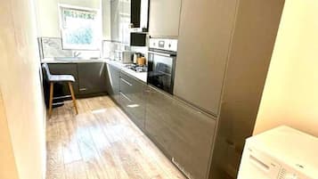 Apartment | Private kitchen | Fridge, microwave, oven, stovetop