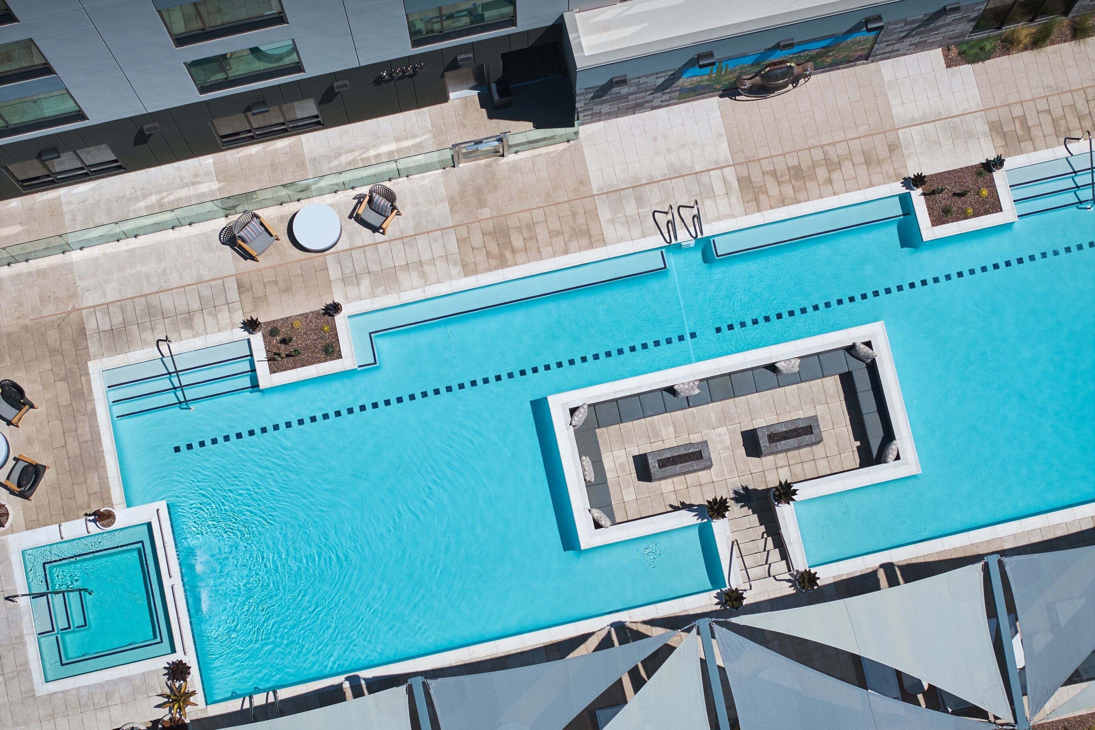 Outdoor pool, open 6:00 AM to 11:00 PM, free cabanas, sun loungers