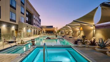 Outdoor pool, open 6:00 AM to 11:00 PM, free cabanas, sun loungers