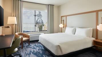 Desk, laptop workspace, blackout curtains, iron/ironing board