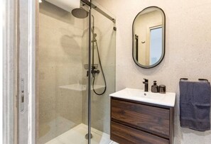 Design Studio | Bathroom | Shower, rainfall showerhead, hair dryer, towels - St Angelo Boutique Living (Sliema)