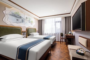Habitación empresarial con 2 camas individuales | Edredón, camas con efecto memoria y decoración personalizada