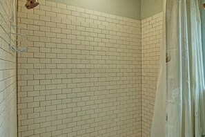 Shower, hair dryer, towels, shampoo