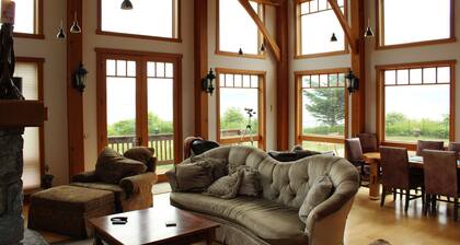 Bay Bluff Haven retreat with an ocean view