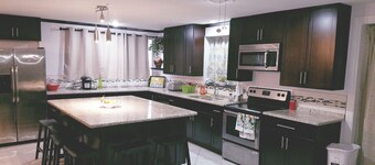 Family Getaway - spacious & near Busch Gardens/USF with Private 1bedroom suite