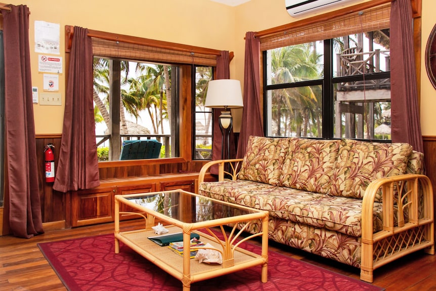 Modern Beach Villa: King Bed + Patio E2 - Sea Front - Ground Floor - Ambergris Caye