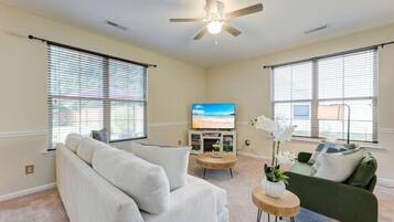 Smart TV, fireplace, table football, books